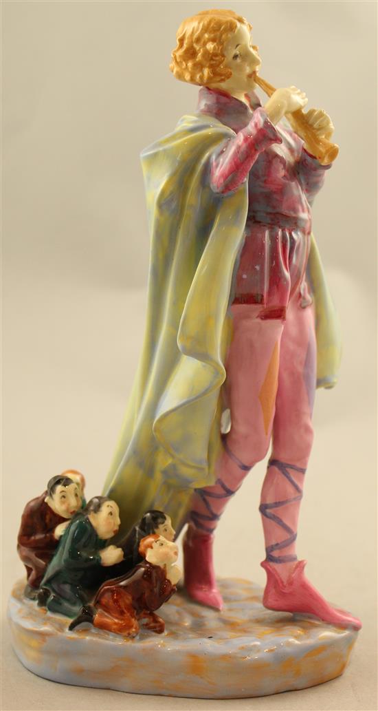 A Royal Doulton group The Modern Piper, c.1932, 22cm